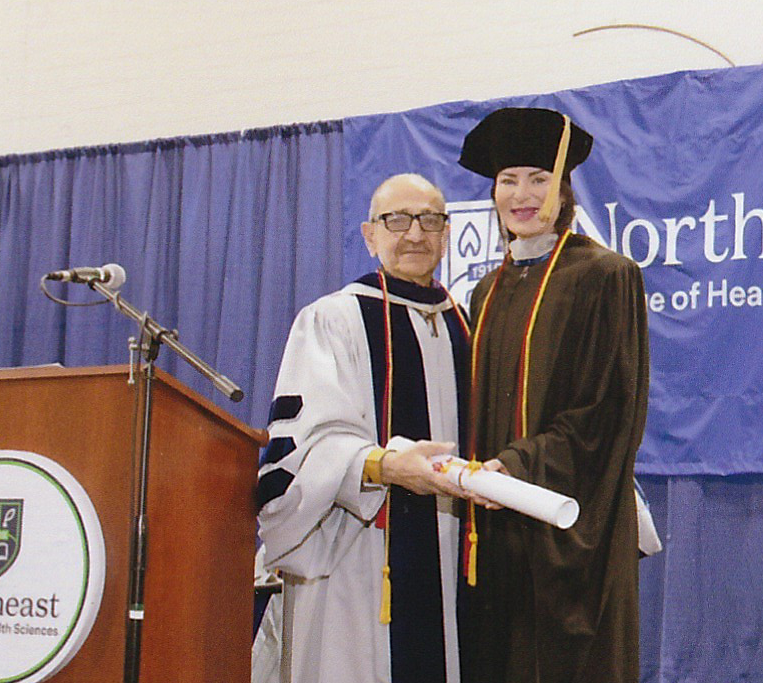 Dr. Hubley being recognized at a commencement ceremony